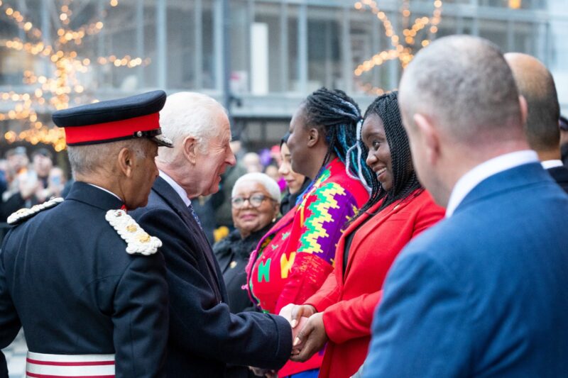 Marsha shaking hands with The King